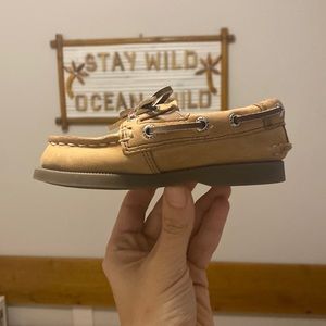 Worn once to church in perfect condition.